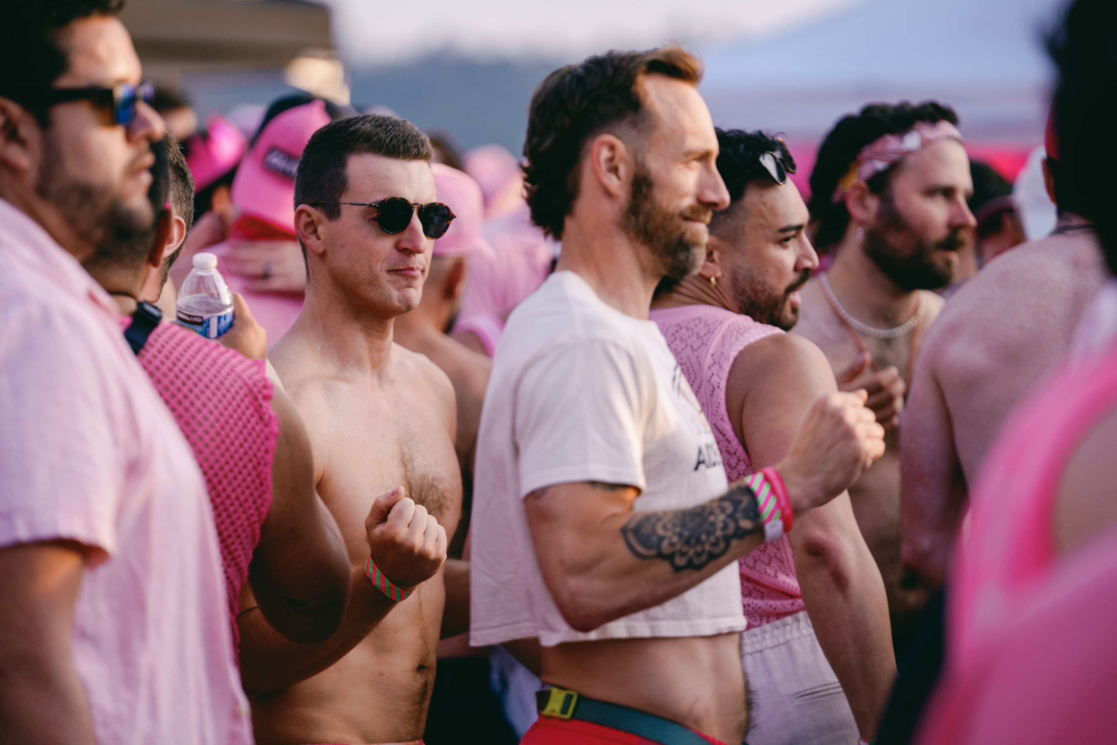 Attendees in pink outfits